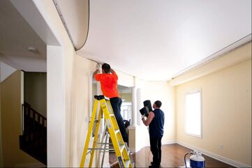 Tradesmen working in a home